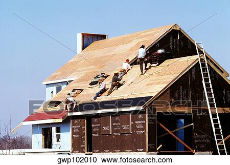 Carpenter Putting roof on new home in MD View Large Photo Image Stock Image - Carpenter Putting roof on new home in MD. Fotosearch