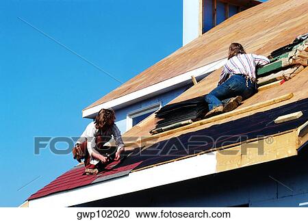 Carpenters putting roof on new home in Maryland View Large Photo Image Stock Image - Carpenters putting roof on new home in Maryland. Fotosearch