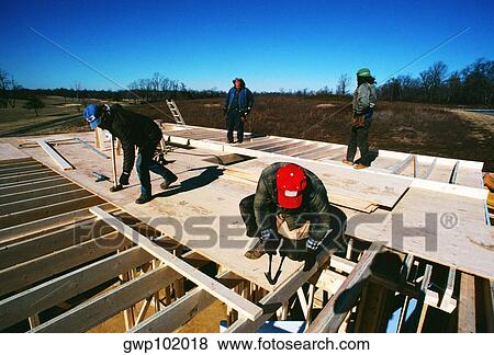 Carpenters working on new home in Prince Georges County, Maryland View Large Photo Image Stock Photo - Carpenters working on new home in Prince Georges County, Maryland. Fotosearch