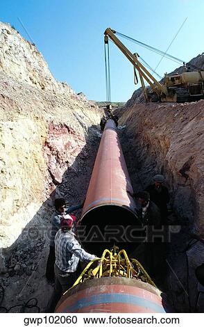Laying 48 inch pipe in Jordan, between Jordan river and Amman View Large Photo Image Stock Image - Laying 48 inch pipe in Jordan, between Jordan river and Amman. Fotosearch