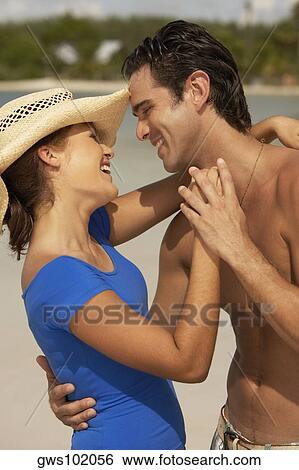 Close-up of a young couple dancing View Large Photo Image Stock Photograph - Close-up of a young couple dancing. Fotosearch