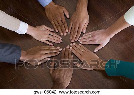 Close-up of human hands on a table View Large Photo Image Stock Image - Close-up of human hands on a table. Fotosearch