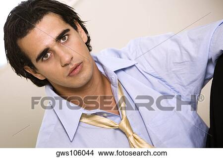 Portrait of a businessman thinking View Large Photo Image Picture - Portrait of a businessman thinking. Fotosearch