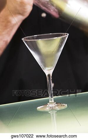 Close-up of an empty martini glass View Large Photo Image Stock Image - Close-up of an empty martini glass. Fotosearch