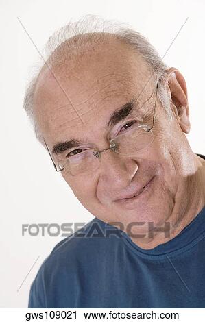 Close-up of a senior man smiling View Large Photo Image Stock Image - Close-up of a senior man smiling. Fotosearch