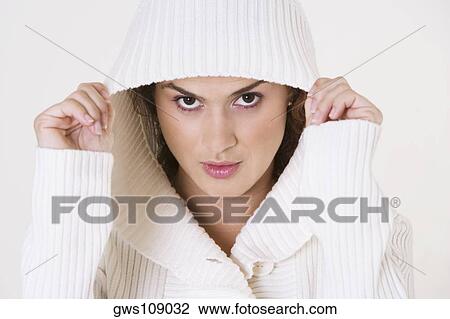 Portrait of a young woman staring View Large Photo Image Stock Image - Portrait of a young woman staring. Fotosearch