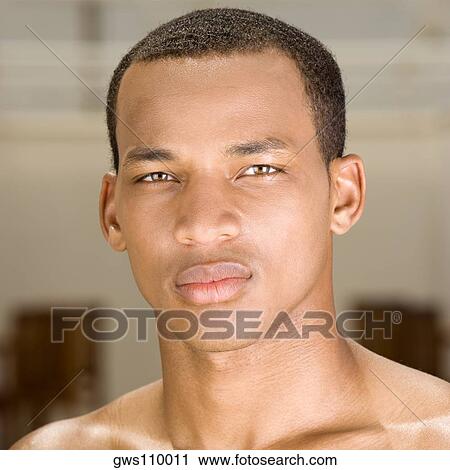 Portrait of a young man looking serious View Large Photo Image Stock Image - Portrait of a young man looking serious. Fotosearch