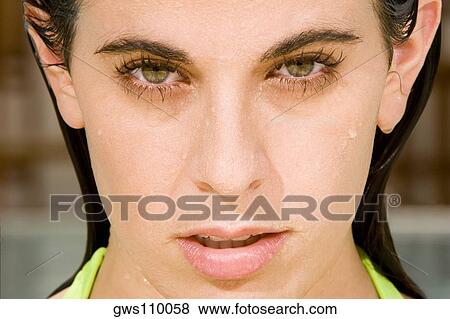 Portrait of a young woman View Large Photo Image Stock Photo - Portrait of a young woman. Fotosearch