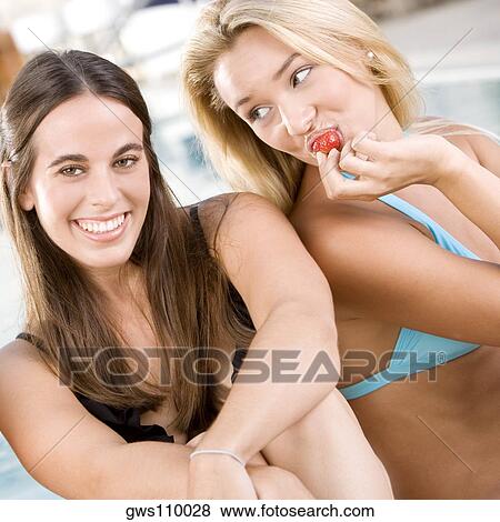 Portrait of two young women smiling View Large Photo Image Stock Photo - Portrait of two young women smiling. Fotosearch
