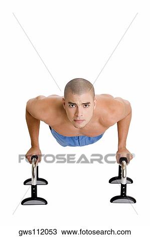 Portrait of a young man doing push-ups View Large Photo Image Stock Image - Portrait of a young man doing push-ups. Fotosearch