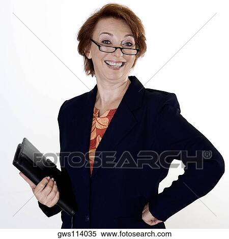 Portrait of a businesswoman holding a file View Large Photo Image Stock Photography - Portrait of a businesswoman holding a file. Fotosearch