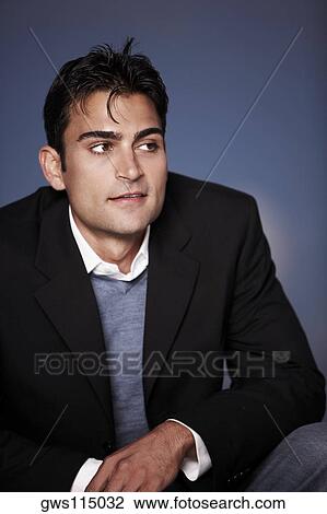 Stock Image - Close-up of a young man smiling. Fotosearch