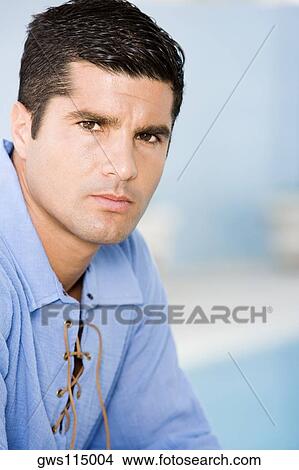 Portrait of a mid adult man looking serious View Large Photo Image Picture - Portrait of a mid adult man looking serious. Fotosearch
