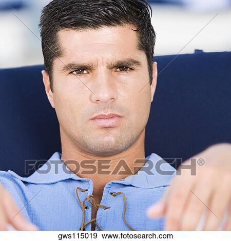 Portrait of a mid adult man looking serious View Large Photo Image Stock Photo - Portrait of a mid adult man looking serious. Fotosearch