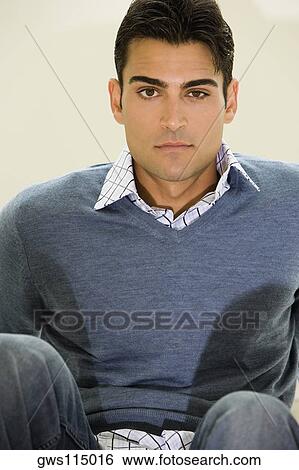 Portrait of a mid adult man sitting View Large Photo Image Stock Photograph - Portrait of a mid adult man sitting. Fotosearch