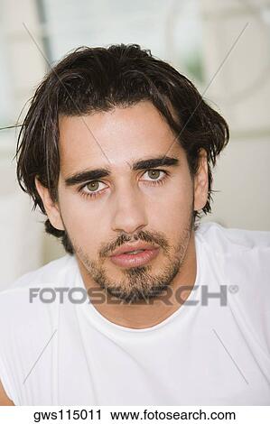 Portrait of a young man View Large Photo Image Stock Image - Portrait of a young man. Fotosearch