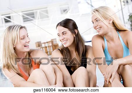 Picture - Close-up of three young women smiling. Fotosearch