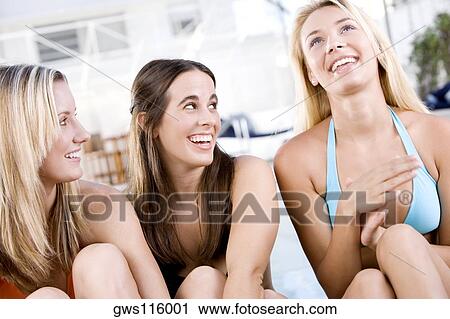 Close-up of three young women smiling View Large Photo Image Stock Image - Close-up of three young women smiling. Fotosearch