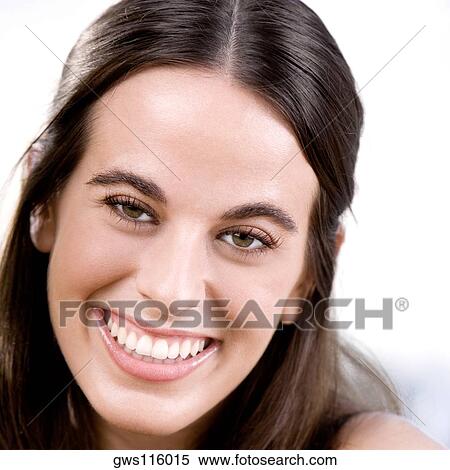 Stock Photography - Portrait of a young woman smiling. Fotosearch