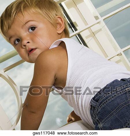 Close-up of a boy View Large Photo Image Stock Photo - Close-up of a boy. Fotosearch