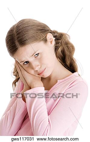 Portrait of a girl looking sad View Large Photo Image Stock Image - Portrait of a girl looking sad. Fotosearch