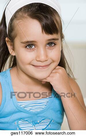 Portrait of a girl smiling View Large Photo Image Stock Photograph - Portrait of a girl smiling. Fotosearch