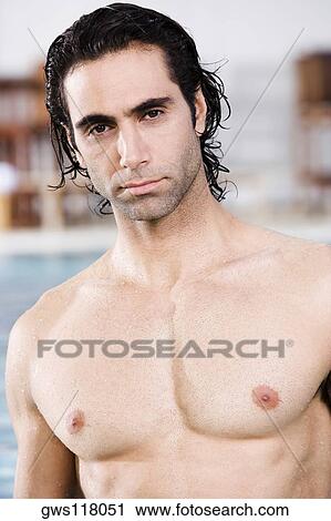 Portrait of a mid adult man at the poolside View Large Photo Image Stock Image - Portrait of a mid adult man at the poolside. Fotosearch