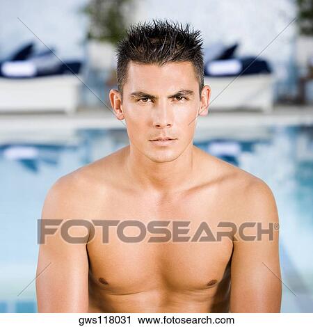 Portrait of a young man looking serious View Large Photo Image Stock Image - Portrait of a young man looking serious. Fotosearch