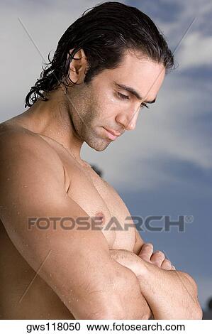 Side profile of a mid adult man looking sad View Large Photo Image Stock Image - Side profile of a mid adult man looking sad. Fotosearch