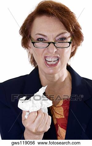 Portrait of a businesswoman crushing paper View Large Photo Image Stock Photograph - Portrait of a businesswoman crushing paper. Fotosearch