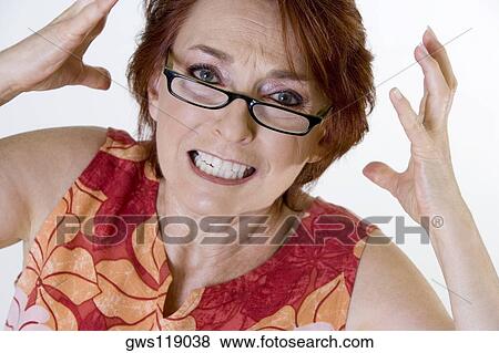 Portrait of a senior woman looking frustrated View Large Photo Image Stock Photo - Portrait of a senior woman looking frustrated. Fotosearch