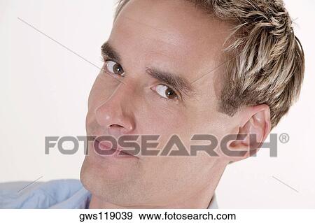 Portrait of a young man View Large Photo Image Stock Photo - Portrait of a young man. Fotosearch