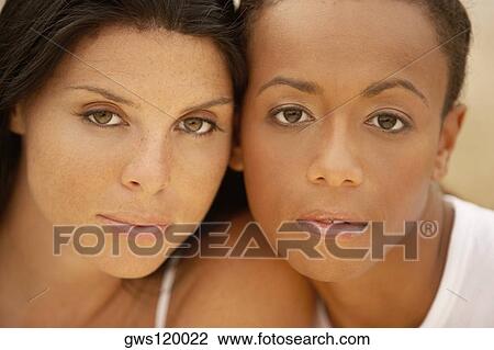 Portrait of two young women View Large Photo Image Stock Image - Portrait of two young women. Fotosearch