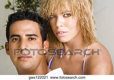Portrait of a mid adult man and a young woman View Large Photo Image Stock Image - Portrait of a mid adult man and a young woman. Fotosearch