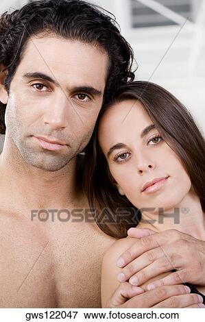 Portrait of a mid adult man and a young woman View Large Photo Image Stock Photo - Portrait of a mid adult man and a young woman. Fotosearch