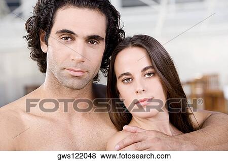 Portrait of a mid adult man and a young woman View Large Photo Image Stock Photo - Portrait of a mid adult man and a young woman. Fotosearch