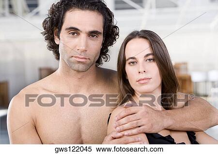Portrait of a mid adult man and a young woman View Large Photo Image Stock Photography - Portrait of a mid adult man and a young woman. Fotosearch