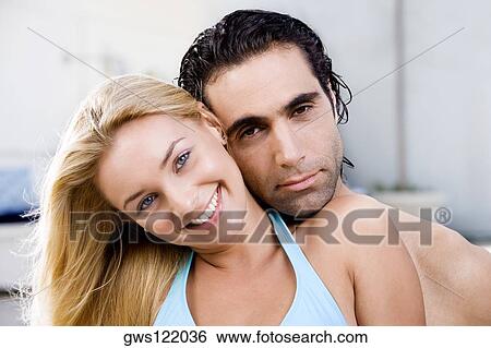 Portrait of a young woman and a mid adult man View Large Photo Image Stock Photograph - Portrait of a young woman and a mid adult man. Fotosearch