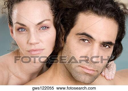 Portrait of a young woman and a mid adult man View Large Photo Image Stock Photography - Portrait of a young woman and a mid adult man. Fotosearch