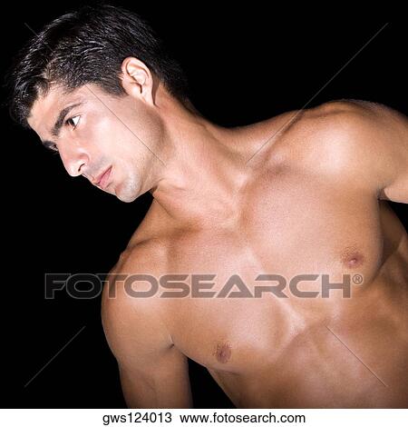 Close-up of a mid adult man looking sideways View Large Photo Image Stock Image - Close-up of a mid adult man looking sideways. Fotosearch