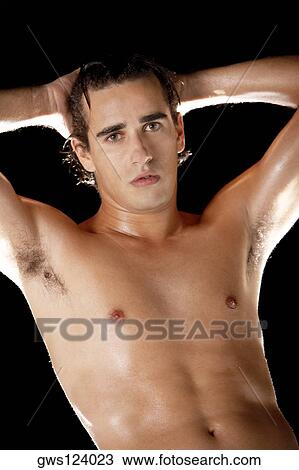 Portrait of a bare-chested young man View Large Photo Image Stock Image - Portrait of a bare-chested young man. Fotosearch