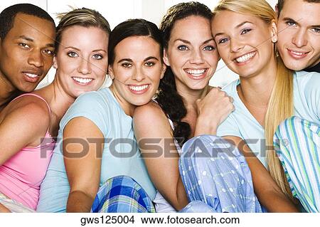Portrait of a group of people smiling View Large Photo Image Picture - Portrait of a group of people smiling. Fotosearch