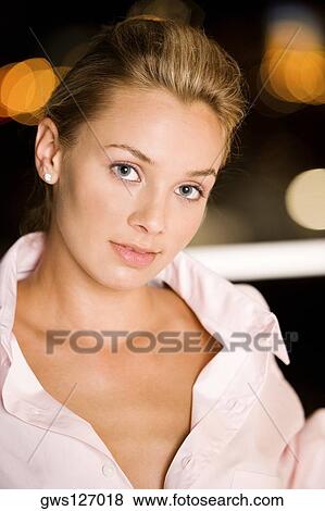 Portrait of a young woman View Large Photo Image Stock Photo - Portrait of a young woman. Fotosearch