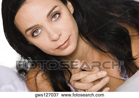 Portrait of a young woman View Large Photo Image Stock Photo - Portrait of a young woman. Fotosearch