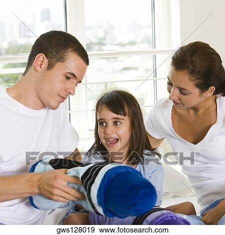 Parents with their daughter View Large Photo Image Stock Photo - Parents with their daughter. Fotosearch