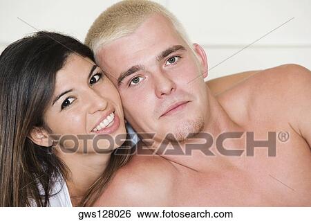 Portrait of a young couple View Large Photo Image Stock Photograph - Portrait of a young couple. Fotosearch