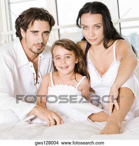 Portrait of parents and their daughter View Large Photo Image Picture - Portrait of parents and their daughter. Fotosearch