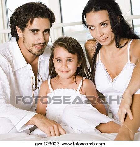 Portrait of parents and their daughter View Large Photo Image Stock Image - Portrait of parents and their daughter. Fotosearch