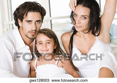 Portrait of parents and their daughter View Large Photo Image Stock Image - Portrait of parents and their daughter. Fotosearch
