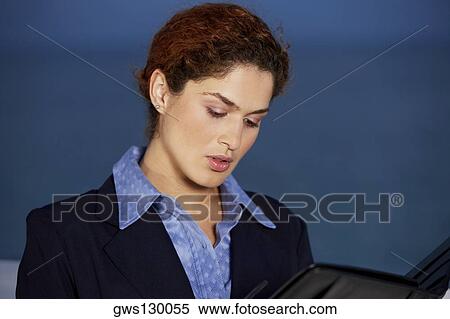 Close-up of a businesswoman View Large Photo Image Stock Photography - Close-up of a businesswoman. Fotosearch